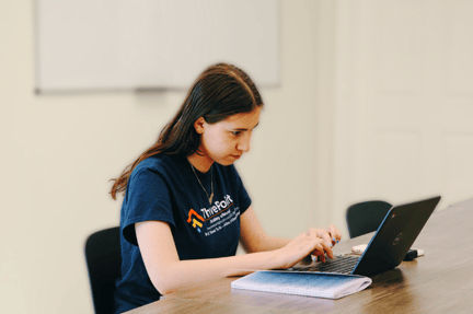 Student learning on a laptop