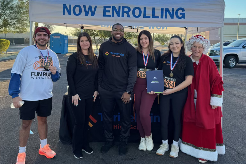 Staff at a 5k run to support ThrivePoint families